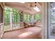 Screened-in porch offering an indoor/outdoor living space perfect for relaxing and entertaining at 309 Appaloosa Trl, Bahama, NC 27503