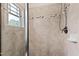 Tile shower with a partial glass enclosure at 3209 Bryant Falls Ct, Raleigh, NC 27613