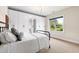 Bedroom with a metal frame bed, white walls, and a wall of white wardrobes at 3209 Bryant Falls Ct, Raleigh, NC 27613