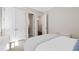 The bedroom offers neutral carpet, light-colored walls, a closet, and a doorway to a private bathroom at 3209 Bryant Falls Ct, Raleigh, NC 27613
