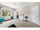 Bright exercise room featuring modern workout equipment and natural light from large window at 3209 Bryant Falls Ct, Raleigh, NC 27613