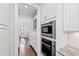 Bright open kitchen with granite countertops, stainless appliances, and subway tile backsplash at 3209 Bryant Falls Ct, Raleigh, NC 27613