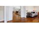 Open-concept living room with hardwood floors and elegant trim at 3209 Bryant Falls Ct, Raleigh, NC 27613