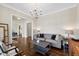Inviting living room with hardwood floors, neutral walls and stylish decor at 3209 Bryant Falls Ct, Raleigh, NC 27613