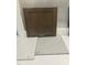 Classic cabinet and flooring selections featuring a neutral palette at 327 Chesapeake Cmns St # 105, Garner, NC 27529