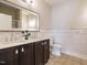 Elegant bathroom featuring a double vanity, modern fixtures, and tiled accents for a spa-like retreat at 33 Juliette Dr, Durham, NC 27713