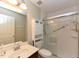 Clean and functional bathroom with a vanity, toilet, and enclosed shower at 3339 Archdale Dr, Raleigh, NC 27614
