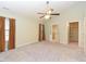 Spacious bedroom with a ceiling fan, ensuite bathroom, and walk-in closet at 3339 Archdale Dr, Raleigh, NC 27614