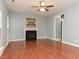 Hardwood floors and a cozy fireplace highlight this comfortable and inviting living room at 3339 Archdale Dr, Raleigh, NC 27614
