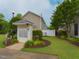 Well-maintained community mailboxes surrounded by lush landscaping and manicured lawns at 3339 Archdale Dr, Raleigh, NC 27614