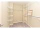 Organized walk-in closet with ample shelving and storage space at 3339 Archdale Dr, Raleigh, NC 27614