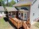 Home with a deck and screened-in porch, perfect for outdoor living and entertaining at 3357 Denise St, Durham, NC 27704