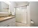 Bathroom with a vanity, shower and a sliding glass door at 3357 Denise St, Durham, NC 27704