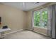 Neutral bedroom with carpet, a large window, and a spacious closet at 3401 Scotch Dr, Raleigh, NC 27616