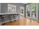 Eat-in kitchen features a breakfast bar with seating and backyard access at 3401 Scotch Dr, Raleigh, NC 27616