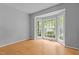 Bright room with bay window, hardwood floors and neutral wall paint at 3401 Scotch Dr, Raleigh, NC 27616