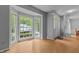 Bright living room featuring a bay window offering great natural light and hardwood floors at 3401 Scotch Dr, Raleigh, NC 27616