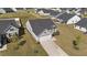 Aerial shot showcasing the home's location, backyard, surrounding neighborhood, and proximity to community at 36 High View Ct, Fuquay Varina, NC 27526