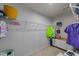 Walk-in closet with white wire shelving and a built-in storage unit at 36 High View Ct, Fuquay Varina, NC 27526