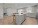 Spacious kitchen island with seating and white countertop, perfect for dining and entertaining at 36 High View Ct, Fuquay Varina, NC 27526