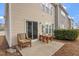 Patio area with outdoor seating and lush landscaping at 4007 Newell Ln, Raleigh, NC 27616