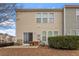 Backyard view featuring a patio, sliding glass door and privacy landscaping at 4007 Newell Ln, Raleigh, NC 27616