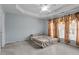 Bedroom with ceiling fan and crown molding at 4007 Newell Ln, Raleigh, NC 27616