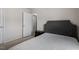 Cozy bedroom featuring a tufted headboard at 4007 Newell Ln, Raleigh, NC 27616