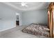 Spacious bedroom with a ceiling fan and ensuite bathroom at 4007 Newell Ln, Raleigh, NC 27616
