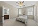 Bright bedroom showcasing natural light, with connecting bath for easy access at 401 Clingstone Ct, Cary, NC 27519