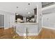 Kitchen island with stools and ample counter space at 401 Clingstone Ct, Cary, NC 27519