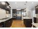 Well-equipped kitchen with stainless steel appliances and ample cabinet space at 401 Clingstone Ct, Cary, NC 27519