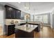 Kitchen island and granite countertops at 401 Clingstone Ct, Cary, NC 27519