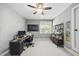 Spacious home office with desk, shelving, natural light and modern amenities at 401 Clingstone Ct, Cary, NC 27519
