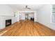 Open living area with fireplace and clear view into the new kitchen and dining room at 407 1/2 Carolina Ave, Raleigh, NC 27606