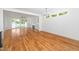 Bright living room with hardwood floors, fireplace, and sliding doors to the outdoor space at 407 1/2 Carolina Ave, Raleigh, NC 27606