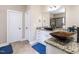 A bathroom features granite countertops, dual sinks, and a stand-up shower at 497 Rockport Dr, Clayton, NC 27527