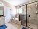 Bathroom features shower, tub, vanity with stone countertops, and tile floor at 497 Rockport Dr, Clayton, NC 27527