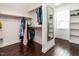 Walk-in closet with hardwood floors and built-in shelving at 497 Rockport Dr, Clayton, NC 27527