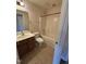 Functional bathroom featuring a vanity with a sink, a toilet, and a shower-tub combination at 523 Berry Chase Way, Cary, NC 27519