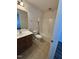 Functional bathroom with a vanity, toilet, and shower-tub combination for essential convenience at 523 Berry Chase Way, Cary, NC 27519