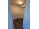 A walk-in closet has wire shelving and modern flooring at 523 Berry Chase Way, Cary, NC 27519