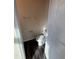Half bathroom with new floors and a classic toilet and vanity at 523 Berry Chase Way, Cary, NC 27519
