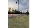Outdoor tennis court surrounded by lush greenery, ideal for recreational activities and exercise at 523 Berry Chase Way, Cary, NC 27519