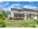 Well-maintained backyard with a screened porch and lush landscaping, offering privacy at 534 Elm Ave, Wake Forest, NC 27587