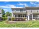 This home features a beautiful backyard and screened-in porch for relaxing outdoors at 534 Elm Ave, Wake Forest, NC 27587