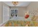 Bright bedroom features hardwood floors, natural light, and closet at 534 Elm Ave, Wake Forest, NC 27587