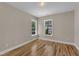 Bedroom features hardwood floors and an abundance of natural light at 534 Elm Ave, Wake Forest, NC 27587