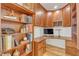 Home office offers custom built-ins and a large workspace at 534 Elm Ave, Wake Forest, NC 27587