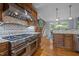 Spacious kitchen boasts a professional-grade stove and views to a cozy breakfast area at 541 The Preserve Trail Trl, Chapel Hill, NC 27517
